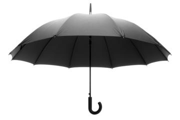 Black umbrella standing against rain in a minimalist, isolated setting indoors