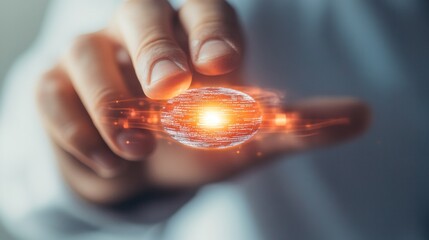 A hand gently manipulates a glowing digital orb, showcasing the interaction between human creativity and advanced technology in a contemporary office setting