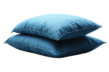 Soft blue pillows stacked perfectly on each other in a cozy living room setting