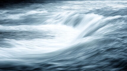 Obraz premium Abstract Blue Water Flowing Rapidly in River