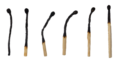 Isolated set of burnt matches on white background