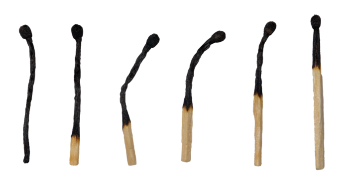 Isolated set of burnt matches on white background