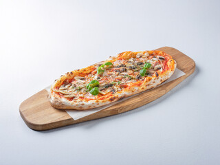 Wood-Fired Mushroom Pizza with Tomato Sauce, Mozzarella, and Fresh Basil on a Wooden Board