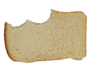 Isolated bitten piece of white rough bread on a white background