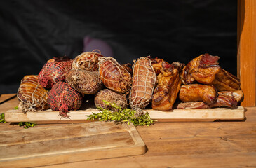 smoked and baked sausage products at a traditional Easter bazaar