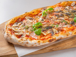 Rustic Mushroom Pizza with Tomato Sauce on a Wooden Board