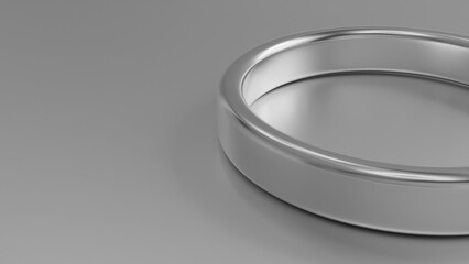 Minimalist Silver Ring on Grey Background