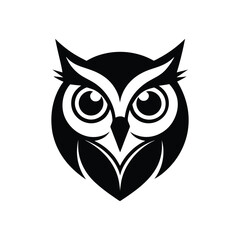 Black and white tribal owl head with wide circular eyes.eps