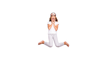 Full size photo of impressed beautiful excited blonde hair  model kid wakeup hear wonderful morning news scream wow omg jump high wear white t-shirt pants isolated over violet purple color background