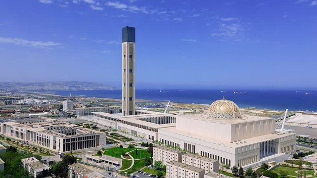 drone shot of the great mosque of algiers with the sea view in the background on a sunny day