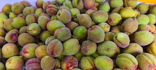 a group of close up fresh peaches