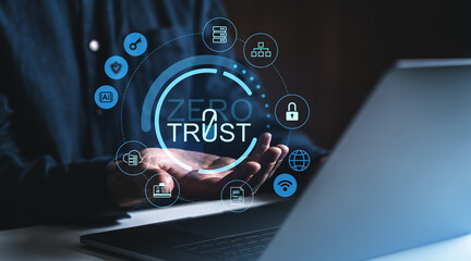 Cybersecurity zero trust concept with icons and glowing interface held above hands in dark creative environment near laptop on background.