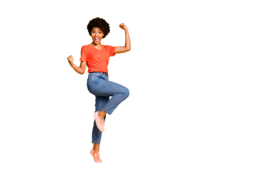 Copyspace photo of cheerful charming cute nice curly pretty sweet attractive girlfriend black skinned wearing jeans denim t-shirt footwear rejoicing isolated over yellow color background