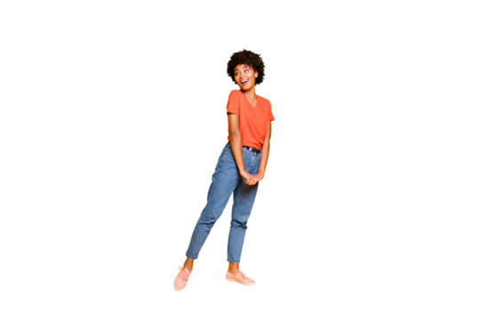 Full length body size photo of charming cheerful cute pretty attractive girlfriend hesitating to ask something wearing jeans denim t-shirt isolated over yellow vivid color background