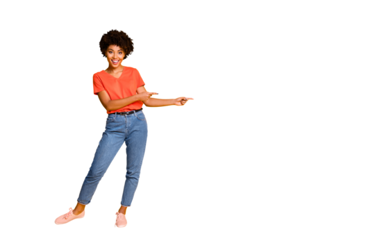 Copyspace full length body size photo of nice charming pretty sweet girl black presenting you something proposing wearing t-shirt jeans denim isolated with yellow vivid color background