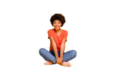 Full length body size photo of curly cheerful funny cute sweet nice pretty african woman sitting on floor with her legs crossed wearing jeans denim isolated voer bright color background