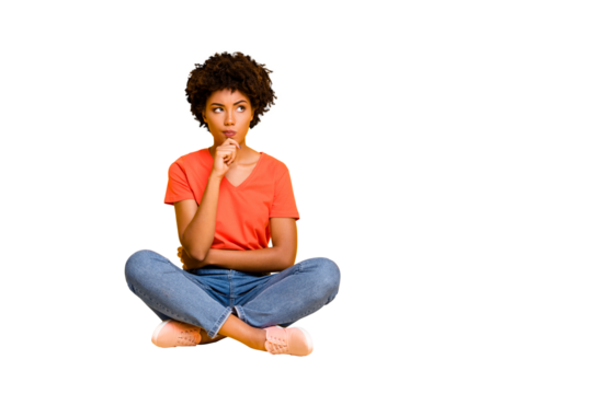 Full length body size photo of pensive solving deciding minded girlfriend sitting with her legs crossed wearing jeans denim t-shirt touching her chin isolated over yellow vivid color background