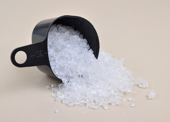 Cadmium nitrate powder on beige background