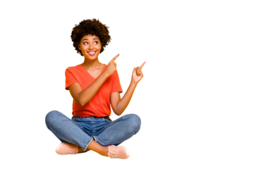 Copyspace photo of charming cheerful attractive gorgeous girlfriend sitting with legs crossed wearing jeans denim footwear isolated with yellow bright color background