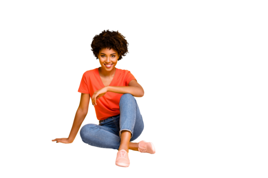 Portrait of positive charming cheerful girl sit have free time enjoy rest relax weekends wear casual style clothes sneakers isolated over yellow bright color background