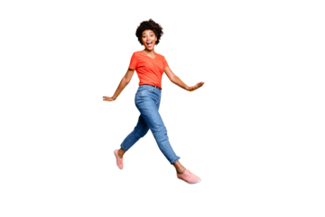 Full body photo of funny funky cheerful lady jump go walk feel crazy have free time wear spring clothes sneakers isolated over yellow color background