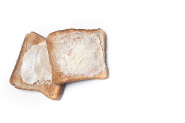 Sliced fresh bread and butter isolated on white background. Top view. Copy space
