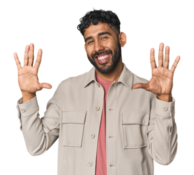 Young Hispanic man isolated showing number ten with hands.