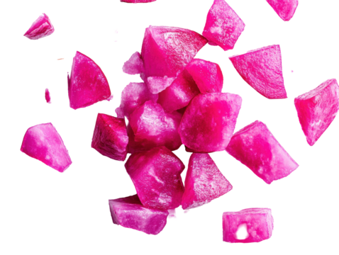 Isolated scattered pieces of pink radish