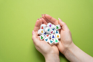 Cubes with people in palms. Human resources department. Recruitment and management of employees. Employee selection, and team building. Organizational control, talent acquisition, and HR strategy.