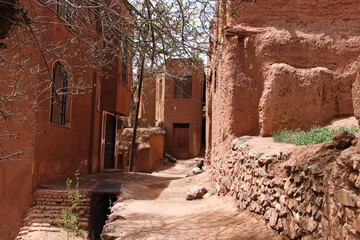 old abandoned house, old alley, village road, clay alley, Quiet alley in a historic village, Ancient street in old Persian town, Ancient Village, Abyaneh, Iran, Persia