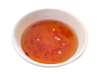 Homemade Vietnamese styled spicy dipping sauce- Nuoc Mam. Sweet and Sour Chili garlic dipping fish Sauce bowl. Nuoc mam. Vietnamese fish sauce isolated. Spicy dipping sauce in a bowl. Chili's dipping 