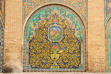 mosaic facade, decorative arch design, Persian tile arch, Colorful arches of Golestan Palace​, Mosaic patterns facade, Traditional Iranian arch design, Historical arch designs of Iran
