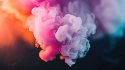 Vibrant swirls of pink, purple, and blue emanate from a dark surface, creating an intriguing abstract composition that captivates the viewer