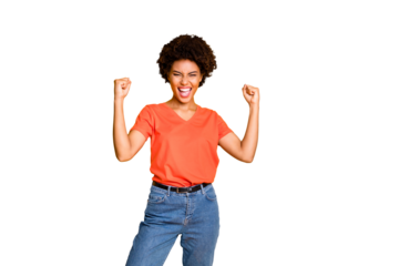 Photo of casual curly wavy trendy victorious excited overjoyed girlfriend crazy with victory wearing orange t-shirt jeans denim making fists isolated over yellow vivid color background
