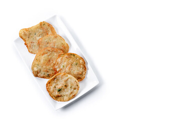 Tortillitas de camarones isolated on white background. Top view. Copy space