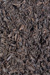 Homemade peat free compost background backdrop made from garden waste scraps.