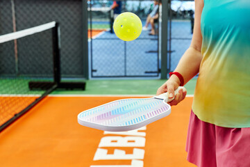 Pickle ball players standing on court with raquet and ball in hands after game, outdoor sport leisure activity