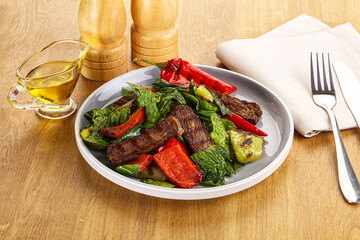 Salad with grilled beef steak