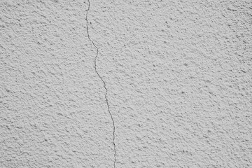 Wall with a noticeable crack highlighting wear and tear over time