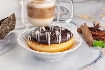 Delicous sweet donut with chocolate glaze