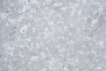 Textured gray concrete surface with subtle variations and patterns