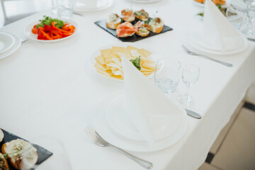 Elegant dining arrangement featuring gourmet food and stylish table setting