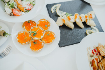 Delightful gourmet dishes served on elegant dining table setting