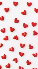 Red hearts forming a pattern on white background for valentine's day