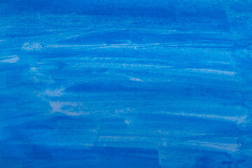 Bright and textured watercolor background in vibrant shades of blue, featuring soft brush strokes and subtle gradients