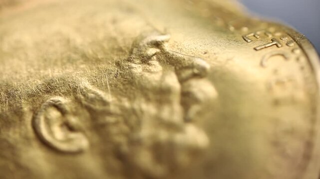 Antique gold coin 1911. Franz Joseph 10 Crowns close up. Austro Hungarian. Macro shot of a valuable coin. Old currency, before the First World War. Ten Corona. The history of Europe