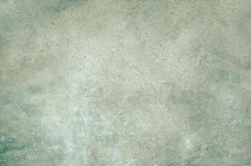 Textured green concrete surface background showing rough pattern