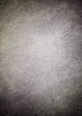 Dark gray textured background creating dramatic and moody atmosphere
