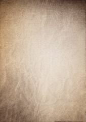 Old beige textured background creating a vintage design