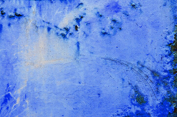 Blue painted canvas texture showing signs of age and wear